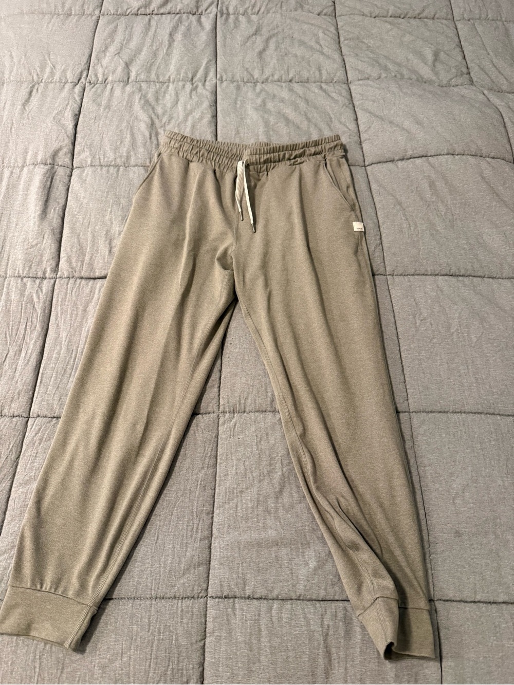 Vuori women’s performance joggers in sage green